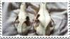 skulls_stamp_by_nine_inch_kales-daa1yzn.