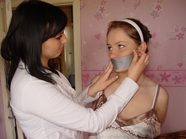 Girls tied up and tape gagged